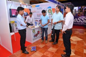 Student trying out a Robotic Kit